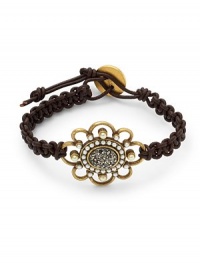 THE LOOKClassic collectionFlower detailBlack Swarovski crystal and glass pearl accentsRhodium-plated settingBraided leatherToggle closure with gold-plated claspTHE MEASUREMENTAccent width, about 1.25Length, about 8.5ORIGINMade in USA