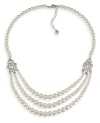 The classic elegance of pearls. Carolee's sophisticated three-row necklace features glass pearls accented by sparkling silver tone spacers with crystal accents. Set in imitation rhodium-plated mixed metal. Approximate length 20 inches + 2-inch extender.