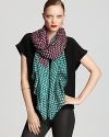 Plan your outfit around DIANE von FURSTENBERG's bright purple and green scarf, featuring an oversized chain link print.