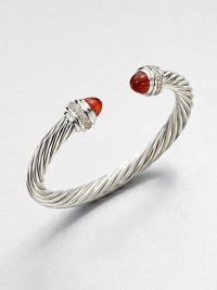 From the Cable Classics Collection. Dazzling diamonds accent this signature sterling silver cable design with carnelian end caps. CarnelianDiamonds, .48 tcwSterling silverDiameter, about 2Slip-on styleImported 