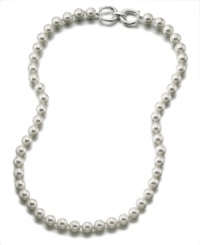 Add a taste of timeless glamor to your wardrobe with this radiant glass pearl (10 mm) necklace. Set in rhodium-plated silvertone mixed metal. Measures approximately 24 inches long.