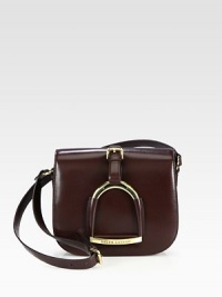 A petite style in luxuriously smooth leather with a large stirrup accent.Adjustable shoulder strap, 14½-15¾ dropMagnetic flap closureOne inside zip pocketOne inside open pocketCotton lining16W X 10H X 7DMade in Italy