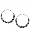 Twist the night away in these colorful hoop earrings from GUESS. A classic silhouette is upgraded with twisted chain detail in colors of the rainbow. Crafted in silver tone mixed metal. Approximate drop: 2-1/4 inches. Approximate diameter: 2 inches.