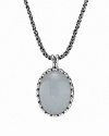 Polished chalcedony set in beaded sterling silver makes a strong visual statement. Pendant necklace by PANDORA.