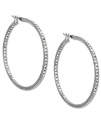 Pave your way to pure fashion. These Jones New York hoop earrings sparkle with crystal glass accents. Crafted in worn silver tone mixed metal. Approximate diameter: 1-3/4 inches.