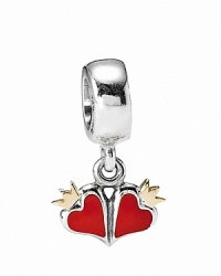 Fiery red enamel colors a double heart PANDORA charm with adorned with 14K gold crowns.