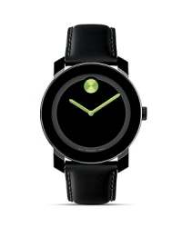 Large Movado BOLD watch with black dial with lime green accents.