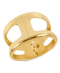 A cut above. Kenneth Cole New York breaks out the norm with this cut-out cuff bracelet. Crafted from gold-tone mixed metal, the bracelet's open pattern is one to embrace. Approximate diameter: 2-1/2 inches.