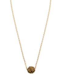 Where there's smoky style, there's red-hot fashion. Anne Klein's pendant necklace radiates heat with a fireball embellished with topaz crystals. Crafted in gold tone mixed metal. Approximate length: 16 inches + 2-inch extender.