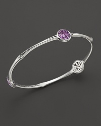 Three sparkling stations add brilliant color to this slim, elegant sterling silver bangle.