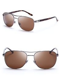 Gucci perfects the aviator with sleek ruthenium frames and protective polarized lenses.