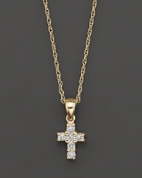 A heavenly diamond cross pendant in 14 Kt. yellow gold, with rope chain.