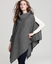 Buckle up this haute houndstooth poncho from Lauren Ralph Lauren for an equestrian-inspired look.