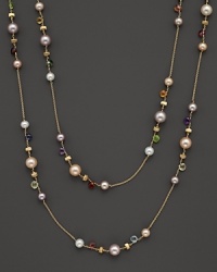 From the Paradise collection, a gold necklace with semi-precious stones and freshwater pearls, designed by Marco Bicego. Shown doubled, but can be worn as one long strand.