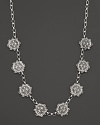 Intricately wrought sterling silver leaves form an elegant necklace. By Buccellati.