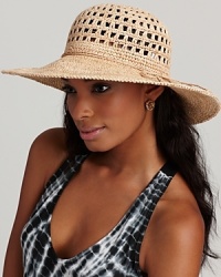 A natural raffia wide brim hat with an open crochet top gives a textural edge to your favorite ensemble.