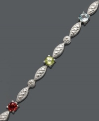 Dress it up with sparkle and shine. This unique tennis bracelet by Victoria Townsend features bursts of round-cut garnet (1/8 ct. t.w.), peridot (1/8 ct. t.w.),  amethyst (1/10 ct. t.w.), blue topaz (1/10 ct. t.w.) and citrine (1/10 ct t.w.). Crafted in sterling silver. Approximate length: 7 inches.