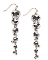 With their long silhouette, INC International Concepts' linear drop earrings are sure to be noticed. Embellished with hematite glass stones and crystal accents. Crafted in gold tone mixed metal. Approximate drop: 2-1/2 inches.