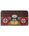 Fossil gives a nod to '70s flower power fashion with this irresistible applique clutch. Rich leather is adorned with flirty floral accents, while the pocket-lined interior stows your stash without a worry.