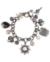 Rise and shine with this multi-charm bracelet from Betsey Johnson. Crafted from hematite-tone mixed metal, the bracelet dazzles with charms adorned with colorful glass crystal accents and faceted beads. Approximate length: 7-1/2 inches.