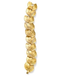 The leaf motif comes cast in 12 karat gold plate and accented by jade stones. Wear this bracelet from Carolee Lux for natural-inspired statement style.