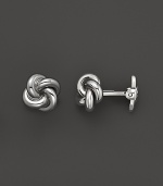 These classic sterling silver cuff links from Dolan & Bullock feature a subtle pattern. From the Sterling Silver Collection.