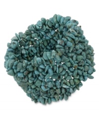 Add a little bohemian inspiration. Avalonia Road's stunning wide bracelet features row upon row of beautiful turquoise chips, all held together in a comfortable stretch design. Approximate diameter: 4 inches. Approximate width: 2 inches.