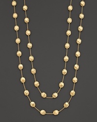 From the Siviglia Collection, the long necklace has large-sized stationed beans, designed by Marco Bicego. Can be worn doubled or as one long strand.