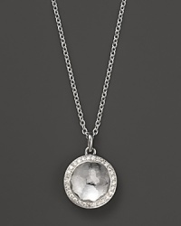 Icy, clear quartz is set in a glittering diamond bezel on Ippolita's Lollipop necklace.