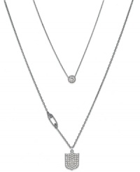 Defend your style. This Juicy Couture necklace features a double strand chain with crystal-embellished shield and safety pin charms. Crafted in silver tone mixed metal. Approximate length: 32 inches + 3-inch extender. Approximate drop: 3/4 inch.