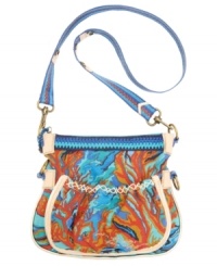 Get ready for your next weekend adventure with this easy-going crossbody by The Sak. Offered in a variety of 60's inspired prints, this travel-ready style will have you feeling the love.