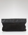 Ease the transition to evening with this mixed media clutch from See by Chloé. Crafted of suede and leather, it's our favorite way to take the textured trend out for the night.