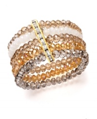 Bring warmth and energy to your ensemble with gold tones and a hint of sparkle. Ali Khan bracelet features five scintillating rows of champagne and neutral-colored glass beads with a row of rhinestone accents. Crafted in gold tone mixed metal. Bracelet stretches to fit wrist. Approximate diameter: 2 inches.