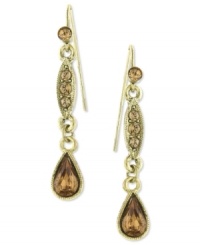 Drops of smoky warmth from 2028. These linear earrings feature faceted teardrops with topaz glass stones. Crafted in gold tone mixed metal. Approximate length: 2 inches.