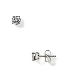 These perfectly faceted stud earrings showcase sparkling cubic zirconia and are handset in sterling silver, finished in pure platinum.