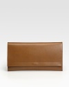 A sleek envelope bag crafted from rich, butter-smooth leather with a contrast exterior pocket on the back.Flap snap closureContrast flat card holder slips into back pocket9½W X 6H X 1½DMade in Italy