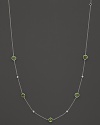 Bezel set diamonds and peridot stones in a sterling silver chaing from Ippolita.