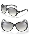 Tom Ford's oversized shades add a note of cool to your summer look. With T temple design and nose tabs to help secure fit.