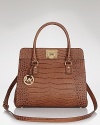 The perfectly sized satchel from MICHAEL Michael Kors complete with gleaming goldtone logo-embossed turnlock closure.