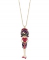 Fashionista statement. Betsey Johnson's necklace, crafted from gold-tone mixed metal, features a girl-on-the-go pendant adorned with glitter and glass crystal accents for that chic touch. Approximate length: 27 inches + 3-inch extender. Approximate drop: 5-1/4 inches.