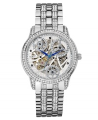 Look inside and see how GUESS creates its timeless designs. With shimmering crystal accents, this self-winding watch is stripped-down excellence.