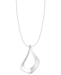 Go to even greater lengths with this necklace from Robert Lee Morris. Crafted from silver-tone mixed metal, the necklace dazzles with a sculptural pendant adorned with glass pave crystal accents. Approximate length: 24 inches + 3-inch extender. Approximate drop: 2-1/2 inches.