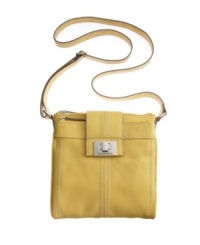 Stay organized while looking fab with this stunning design by Tignanello. This stylish crossbody features an ultra functional interior for easy access to cards and cash. A polished turnlock closure and signature silvertone hardware add a perfectly posh appeal.