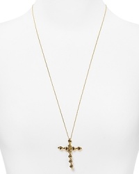 Cast in 14-karat gold and gunmetal plate, this House of Harlow 1960 necklace styles edgy glamor with its double sided cross pendant.