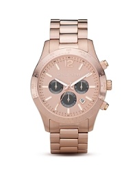 On-trend and ultra-luxe, this gleaming rose-gold tone watch with three-eye design sets your look to chic. From MICHAEL Michael Kors.