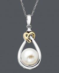 Adorn yourself in timeless design. A chic teardrop setting in sterling silver cradles a smooth cultured freshwater pearl (8 mm) and diamond accent. A touch of luxury is added with a rich 14k gold heart. Approximate length: 18 inches. Approximate drop: 3/4 inch.