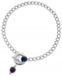 Well rounded. Crafted in silver tone, nickel-free mixed metal, this chain from T Tahari also features a toggle front closure. With a faceted blue Montana crystal and amethyst crystal. Approximate length: 18 inches. Approximate drop: 1-1/4 inches.