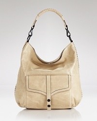 In leather, Rebecca Minkoff gives the slouchy hobo added attitude, for a rebellious spin on day-right style.