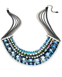 Walk proud in this necklace from c.A.K.e. by Ali Khan. Crafted from silver-tone and hematite-tone mixed metal, the necklace shimmers brightly with multicolor glass cubes for a bit of animal magnetism. Approximate length: 18 inches + 3-inch extender. Approximate drop: 1-1/4 inches.