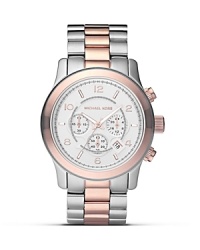 Adopt a feminine approach to accessorizing with this silver and rose gold plated watch from MICHAEL Michael Kors, boasting a boldly sized face and two-tone bracelet.